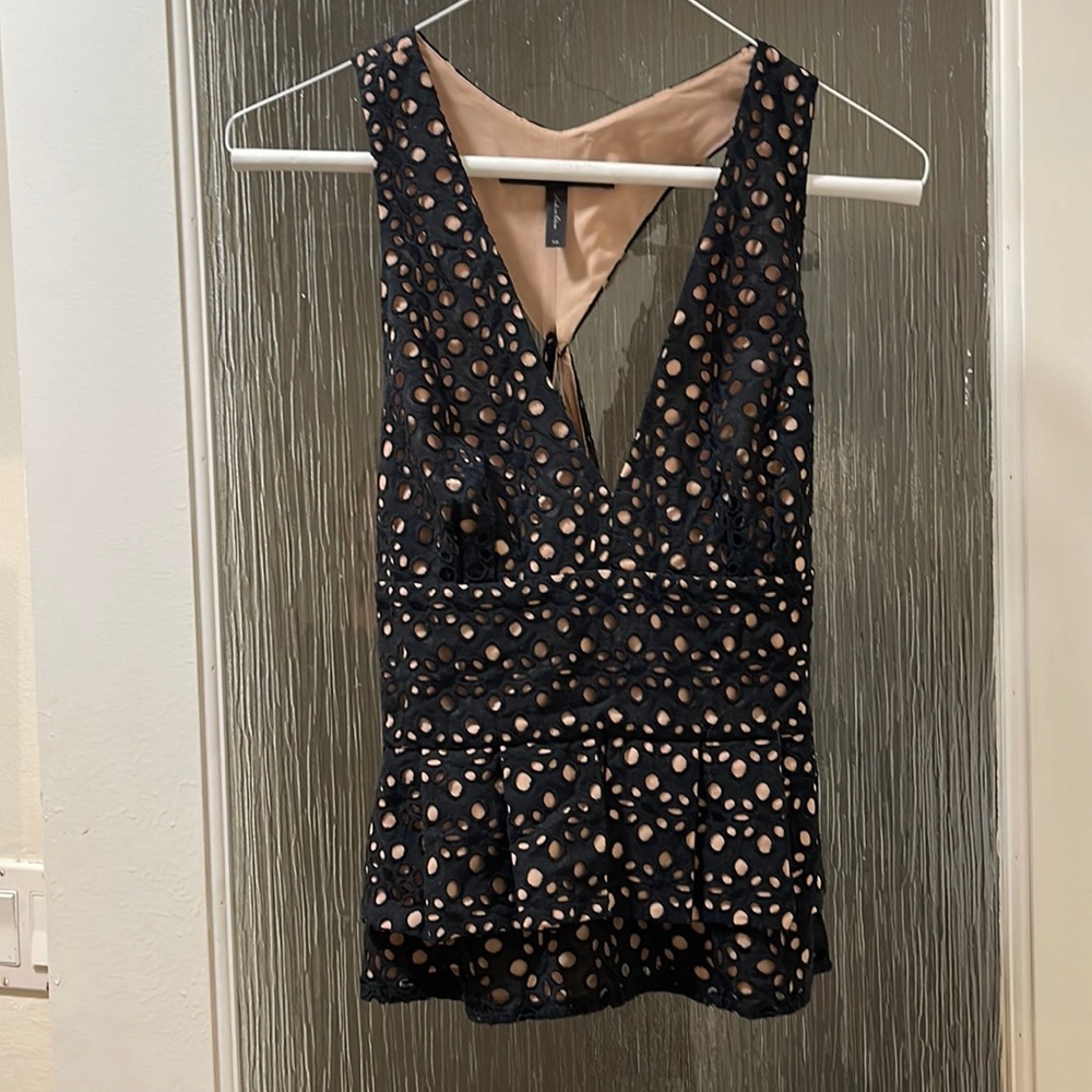Black and tan zipped tank top